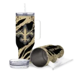 personalized new orleans saints claw cut gold black curved tumbler best selling.webp