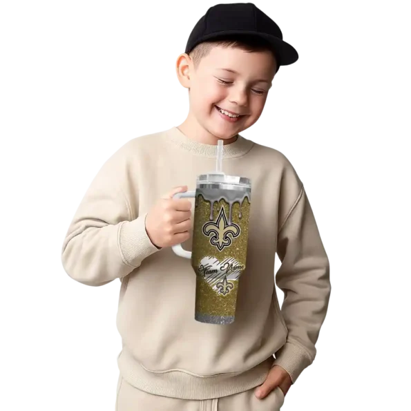 personalized new orleans saints heart helmet motif gold curved tumbler latest model.webp