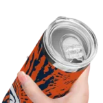 customized-denver-broncos-metallic-grid-orange-skinny-tumbler-best-selling.webp