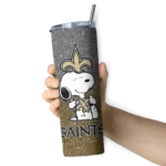 customized-new-orleans-saints-snoopy-attitude-gold-skinny-tumbler-best-selling.webp
