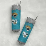 personalized-jacksonville-jaguars-pixel-fade-teal-skinny-tumbler-best-selling.webp