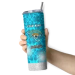 personalized-jacksonville-jaguars-starburst-tiles-teal-skinny-tumbler-best-selling.webp