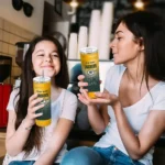 customized green bay packers swirl texture green skinny tumbler best selling.webp