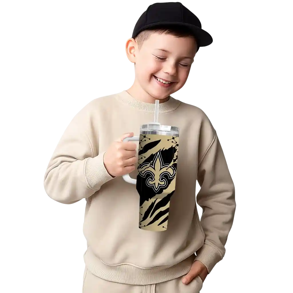 personalized new orleans saints claw cut gold black curved tumbler latest model.webp personalized new orleans saints claw cut gold black curved tumbler latest model.webp